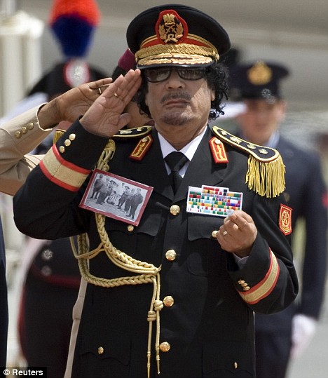 Muammar Gaddafi is often potrayed as the Man of Steel and The Libyan Tiger. Muammar Gaddafi is often potrayed as the Man of Steel and The Libyan Tiger.