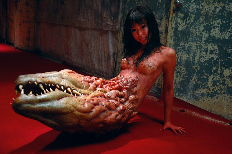 [alligator+woman.jpg]
