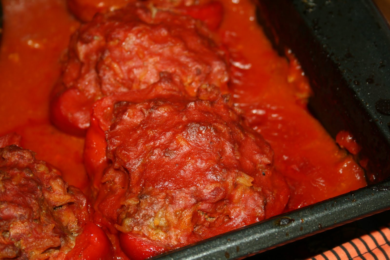 Stuffed Bell Peppers with Tomato Sauce