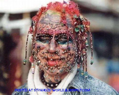 Horrible body piercing @ strange world