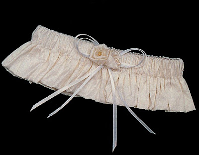This gorgeous something blue wedding garter set features a chiffon skirt This gorgeous something blue wedding garter set features a chiffon skirt