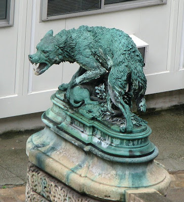 Baroque Wolf Sculptures in a Louvre Courtyard