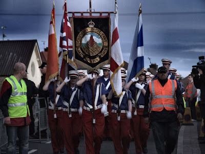 uvf 2009 causeway august flags protest cookstown residents carry past band