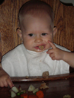 baby eating meatloaf