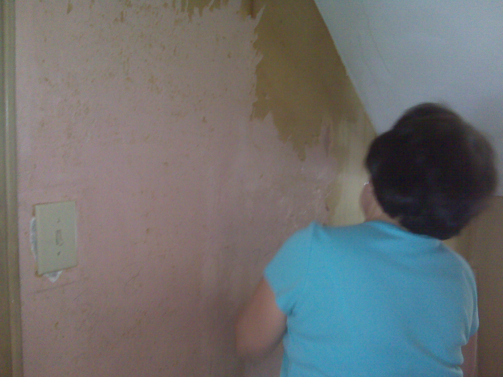 ... can see, there are nice pink-painted walls underneath the paste