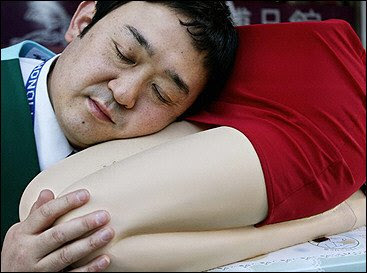 woman pillow, legs pillow, pillow legs, weird pillows, pillow shaped like legs, funny asians, weird inventions