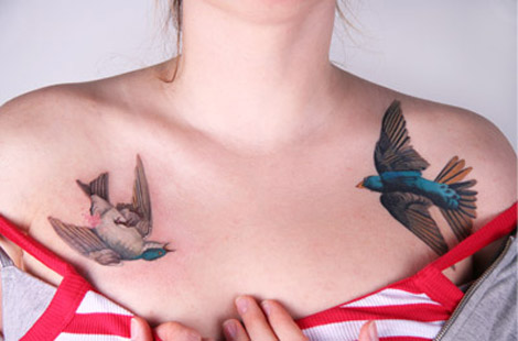 tattoos of birds. black ird tattoo. lack ird