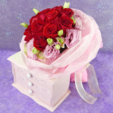 12 Red Roses with Pink Eustoma Hand Bouquet @ $98...