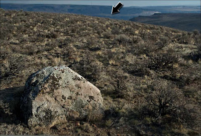 Ice-rafted erratic and Interstate 90 bridge at Vantage, Washington.