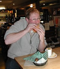 Sid Stuffs Sandwich Into his Mouth at Allysons Kitchen