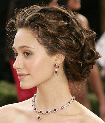 Scandalous Prom Dresses. Upgrade a simple updo to a