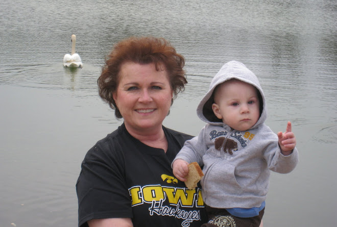 A picture of Ethan feeding the ducks