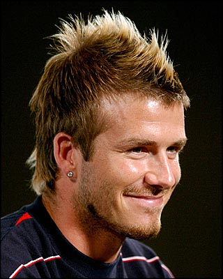 David Beckham in short hairstyle with a cute smile on his face
