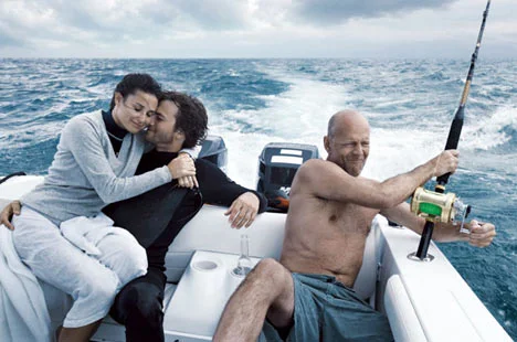 A very strange divorce: Bruce Willis holidays with ex-wife and her lover