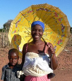 [33333+P1070723+momwithparasolresized.jpg]