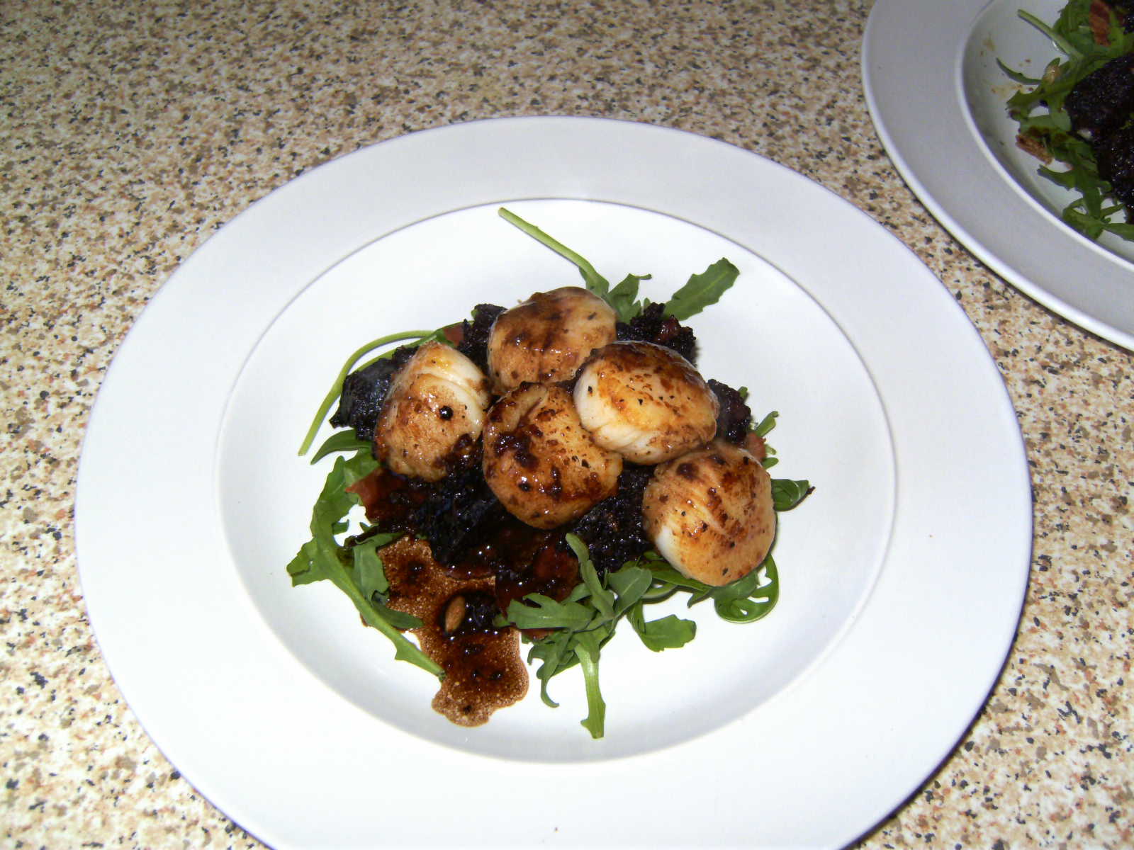 White Wine in the City Scallops with black pudding, crispy bacon and