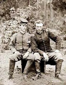 Capt. Custer with Captured Confederate prisoner,  James B. Washington. 1862