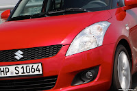 2011-Suzuki-Swift-13.jpg