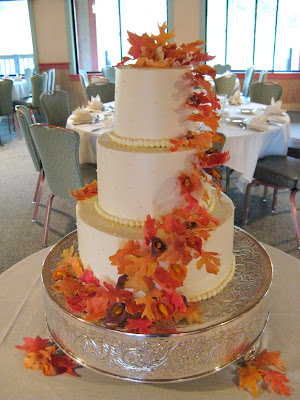 Wedding cake with gum paste fall leaves and mini calla blossoms by Betty 