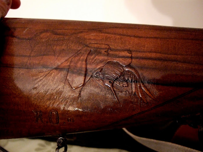 (Rodolfo Orecchio) legno di calcio di fucile raffigurante scena di caccia
