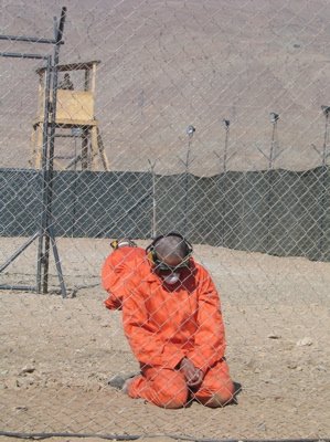 [AGuantanamoscenemanprayinginorangejumpsuit.jpg]