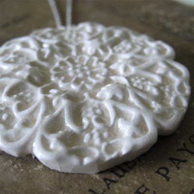 cream porcelain baroque style pendant from sofiamasri