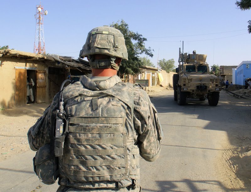 [Sgt.-Clark-and-an-MRAP.jpg]