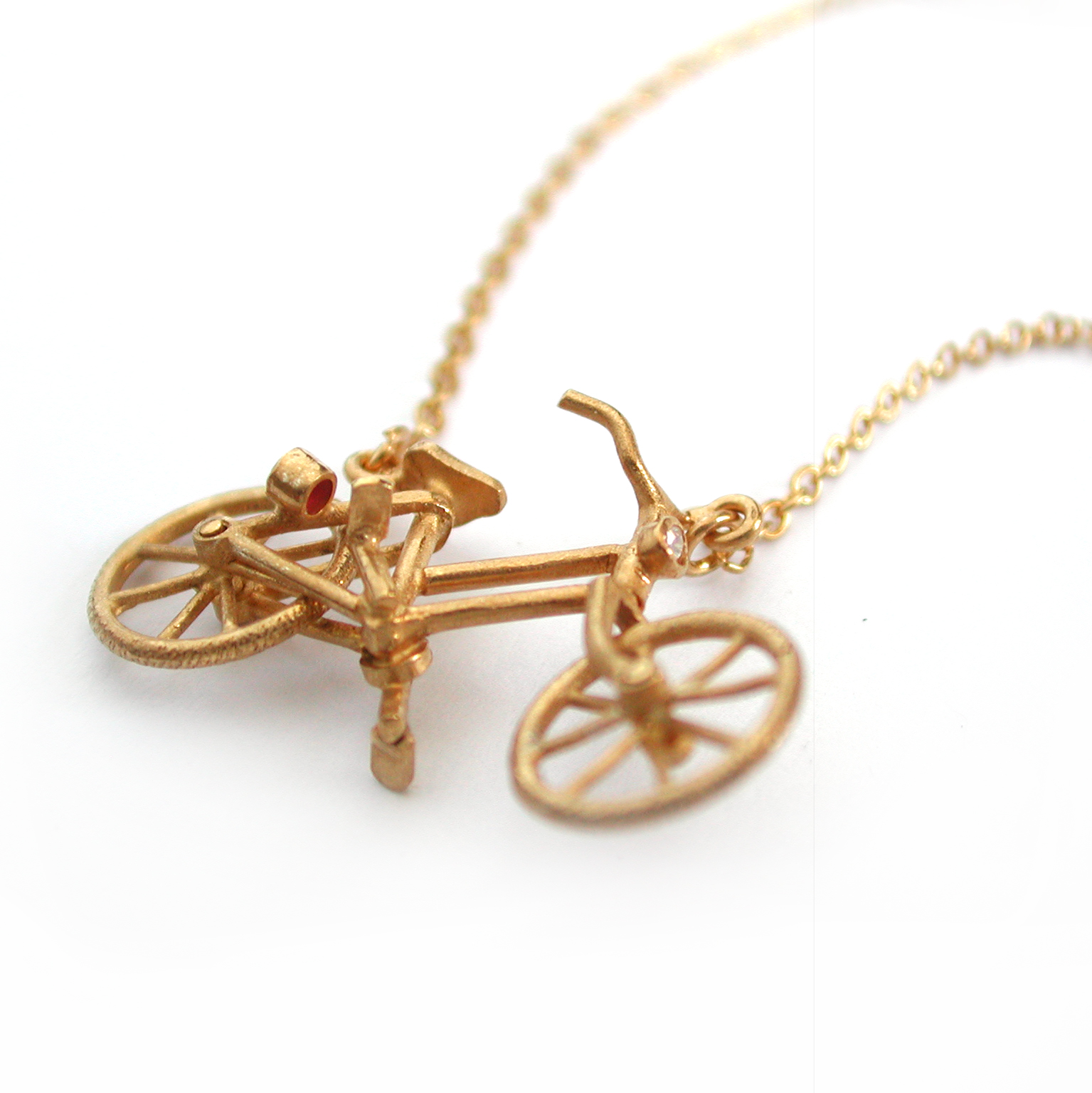 Like Gold Dust Alex Monroe's Charity Bicycle Necklaces