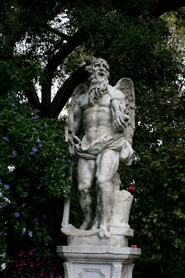 Winged Father Time statue