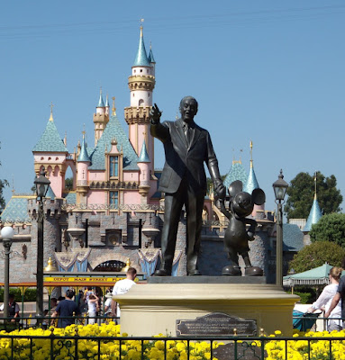 Walt Disney and Mickey Mouse statue at Disneyland