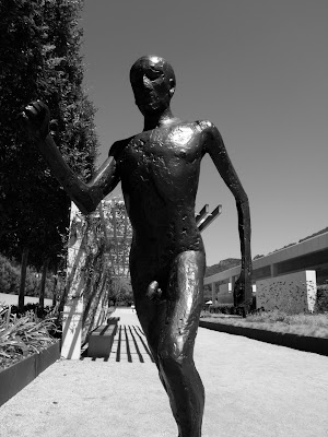Elisabeth Frink's Running Man sculpture in mono