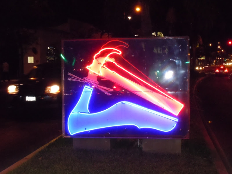Zinke's Route 66 Lights neon sign at night