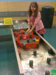 Anna at science center building water works