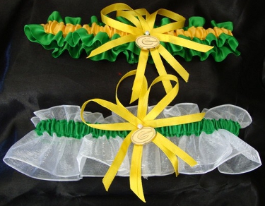 two garters with green, yellow and white ribbon
