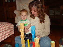 Aunt Karen builds block towers