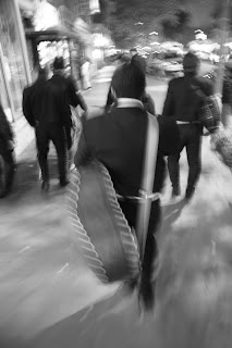 Mariachis walking down Mount Pleasant Street