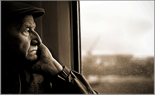 elderly-man-staring-out-window.gif