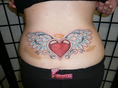 Cross With Wings heart and wings tattoo, by the neck