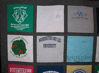 Kathy's college years t-shirt quilt. Pieced and quilted by Angela Huffman - QuiltedJoy.com