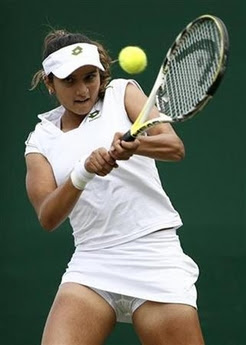 India's Sania Mirza plays a return during her singles match against Russia's ... India's Sania Mirza plays a return during her singles match against Russia's ...
