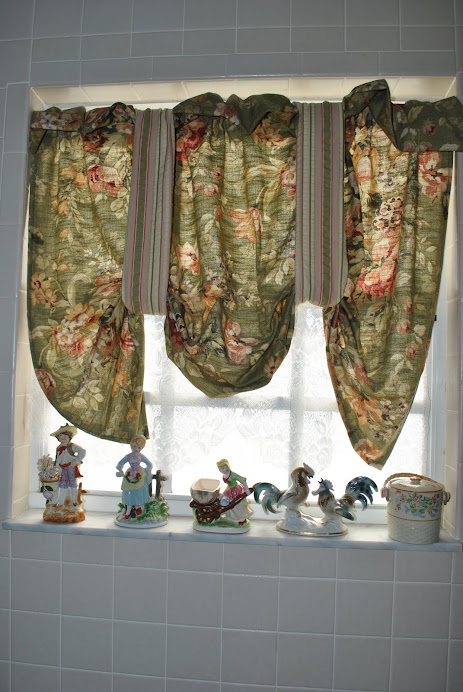 Easy-to-make curtains required a fabric remnant and a few seams.