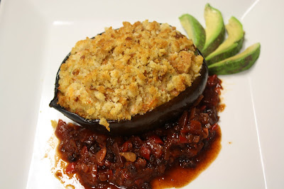 Roasted Acorn Squash Filled with Snow Crab Stuffing and served with Fresh Avocado and a Spiced Tomato Chutney