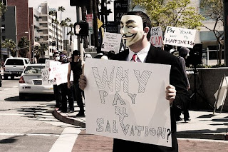 'anonymous' member unmasked, charged w/ hack on scientology