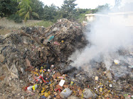 One of many burning trash piles