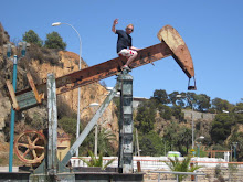 Dave riding a rusty old derrick...