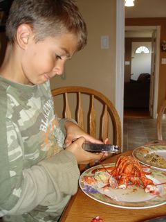 [hunter+eating+lobster]