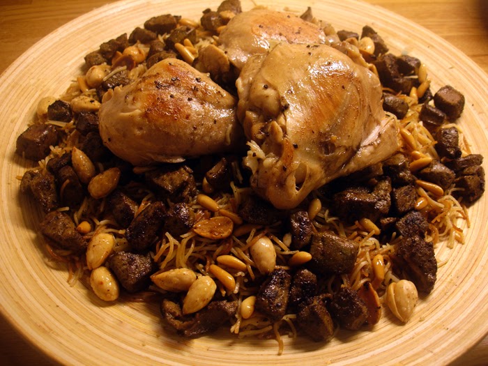 libyan food Steamed Pasta with Pine Nuts, Raisins, Almonds, and Liver