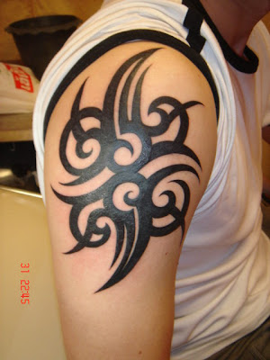 This one a perfect symmetrical tribal tattoo. The tattoo looks like it is 