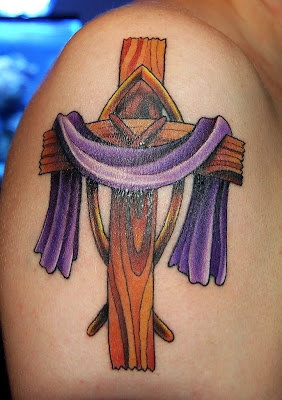 Fish and Cross Tattoo at the Shoulder