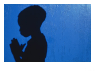[491577~Shadow-of-a-boy-praying-against-a-blue-wall-Affiches.jpg]